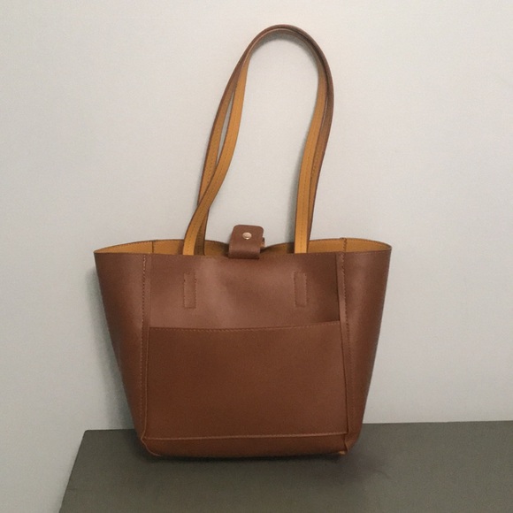 Tommy Bahama Reversible Faux Leather Tote Wristlet - Picture 8 of 16